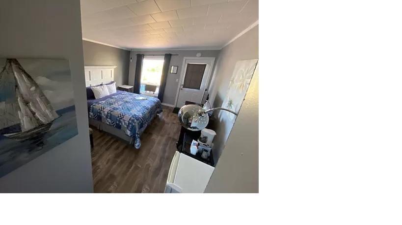 The Pines Motel And Cottages Rustico Bagian luar foto